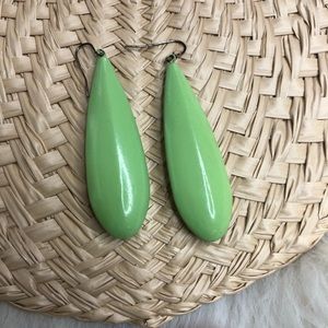 Vintage light green plastic tear drop dangle earrings.